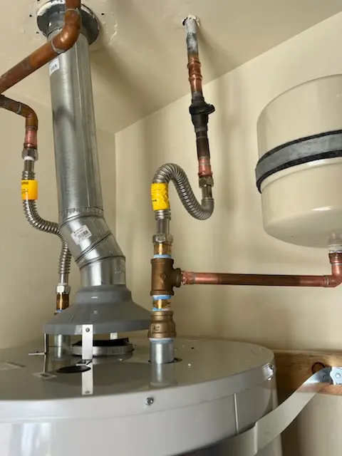 Water heater installation and plumbing repair in Alma